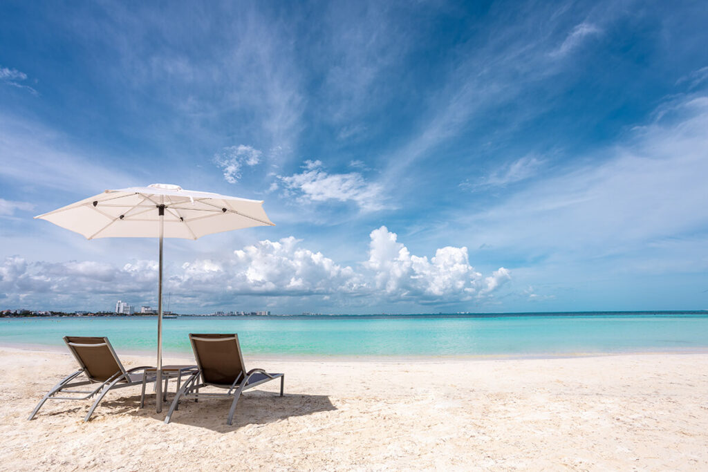 Beach and sand view of the ocean on a luxury vacation.